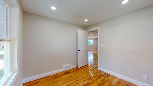 32 Miles Standish Dr, West Hartford, CT 06107 - empty room featuring light wood-style floors and recessed lighting