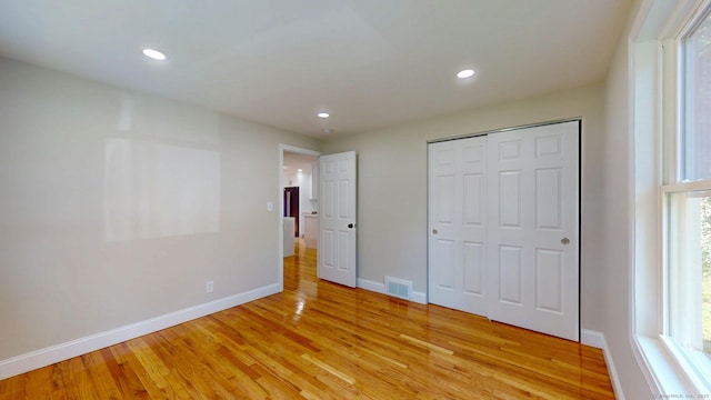 32 Miles Standish Dr, West Hartford, CT 06107 - unfurnished bedroom featuring light wood finished floors, recessed lighting, and a closet