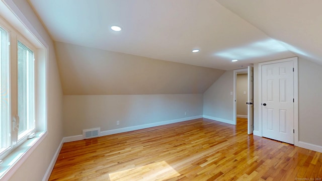 32 Miles Standish Dr, West Hartford, CT 06107 - bonus room featuring light wood-type flooring, lofted ceiling, and recessed lighting