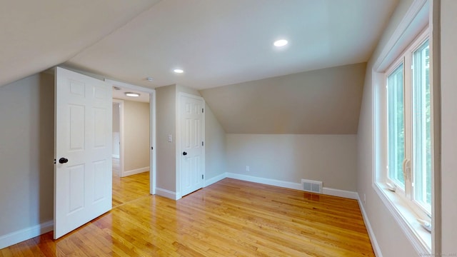 32 Miles Standish Dr, West Hartford, CT 06107 - additional living space featuring healthy amount of natural light, light wood finished floors, lofted ceiling, and recessed lighting
