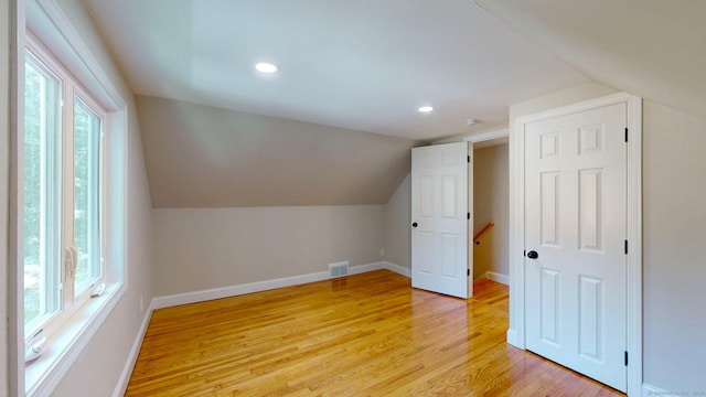 32 Miles Standish Dr, West Hartford, CT 06107 - bonus room featuring light wood finished floors, lofted ceiling, and recessed lighting