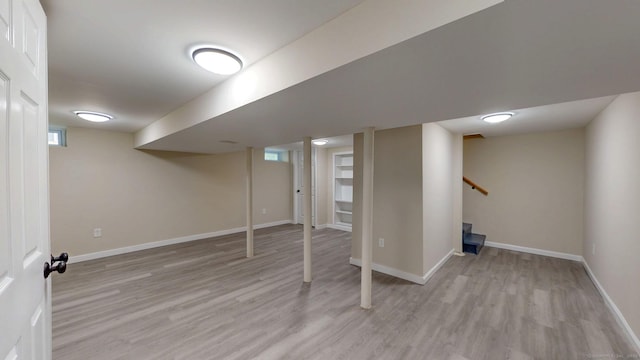 32 Miles Standish Dr, West Hartford, CT 06107 - basement featuring wood finished floors and stairway