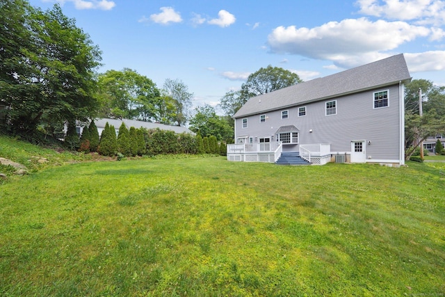 83 Cottage St, Trumbull, CT 06611 - rear view of property featuring a deck and a yard