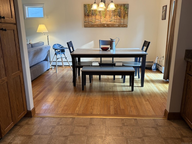 175 Luna Trail Ext, Southbury, CT 06488 - dining space featuring a chandelier and dark floors
