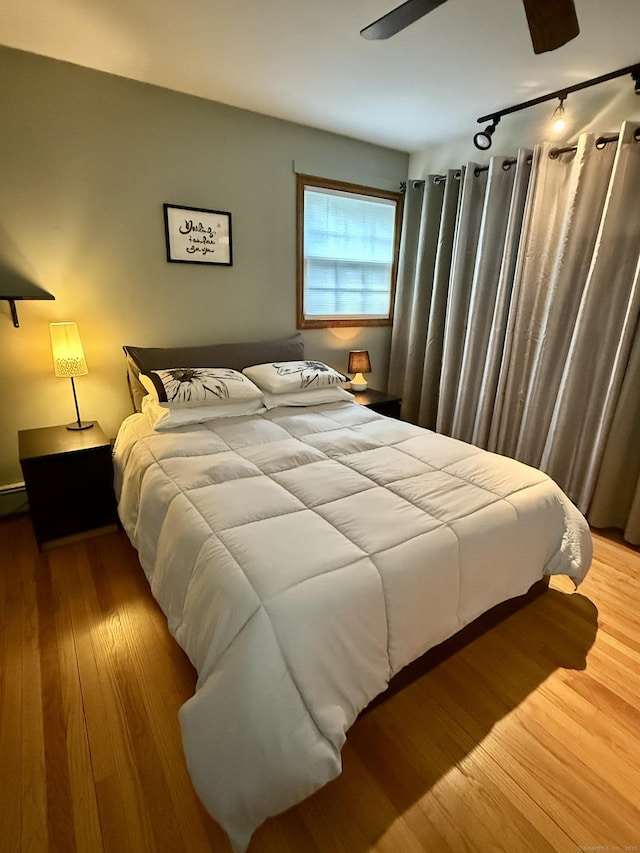 175 Luna Trail Ext, Southbury, CT 06488 - bedroom featuring track lighting and wood finished floors