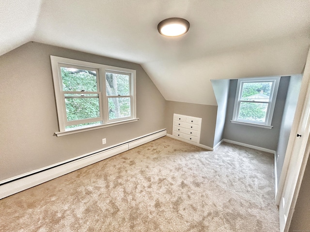 342 Middle Tpke E, Manchester, CT 06040 - additional living space with vaulted ceiling, a baseboard radiator, and carpet floors