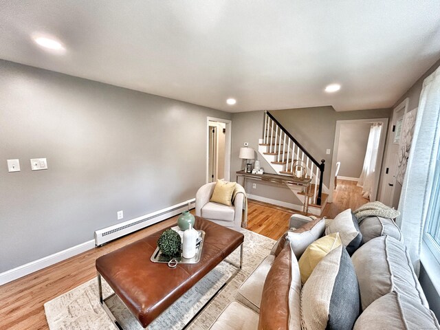 342 Middle Tpke E, Manchester, CT 06040 - living room with a baseboard heating unit, stairway, recessed lighting, and wood finished floors