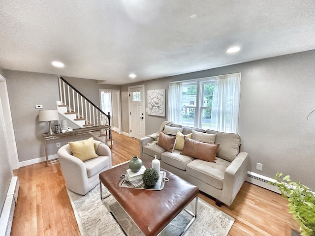 342 Middle Tpke E, Manchester, CT 06040 - living area featuring light wood-style flooring, stairs, recessed lighting, a textured ceiling, and a baseboard heating unit