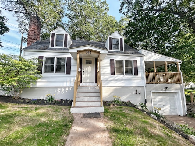 342 Middle Tpke E, Manchester, CT 06040 - cape cod home with a chimney, a garage, driveway, and a front yard