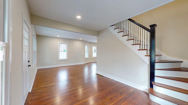 274 High St, Fairfield, CT 06824 - entrance foyer featuring wood finished floors, stairs, and recessed lighting