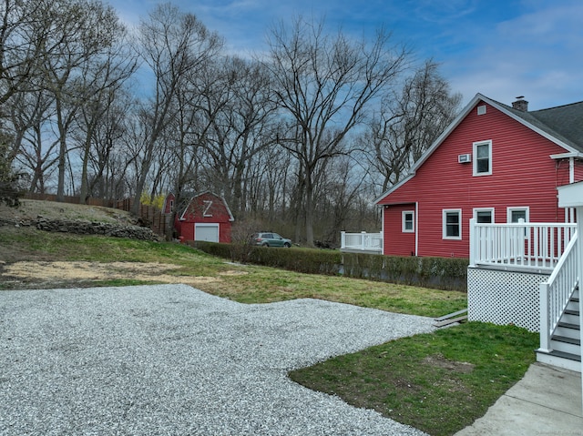 274 High St, Fairfield, CT 06824 - view of green lawn with stairway and an outbuilding