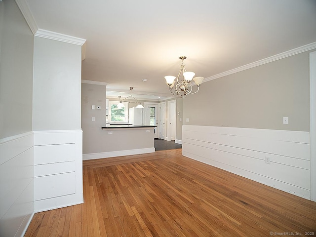 42 Homewood Ave, North Haven, CT 06473 - empty room featuring a chandelier, ornamental molding, and wood-type flooring