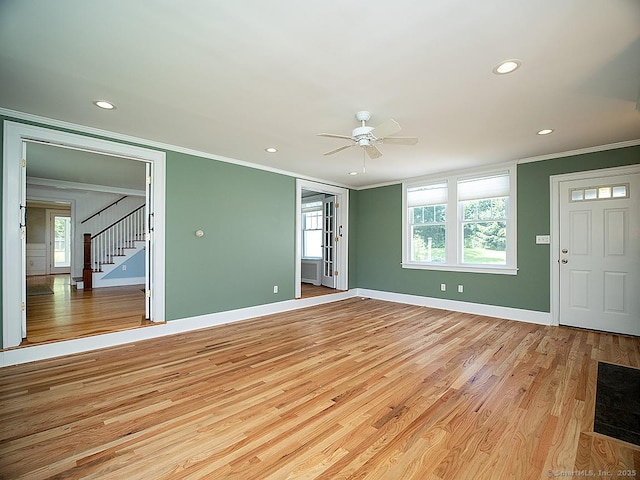 42 Homewood Ave, North Haven, CT 06473 - unfurnished room with crown molding, a ceiling fan, stairs, light wood finished floors, and recessed lighting