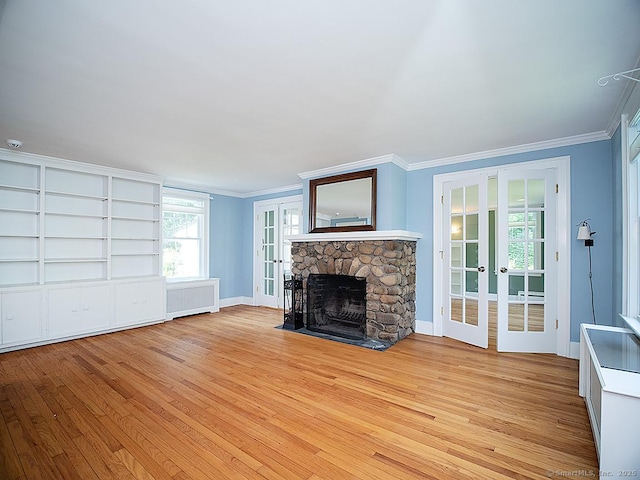 42 Homewood Ave, North Haven, CT 06473 - unfurnished living room featuring french doors, ornamental molding, radiator heating unit, and light wood-style floors