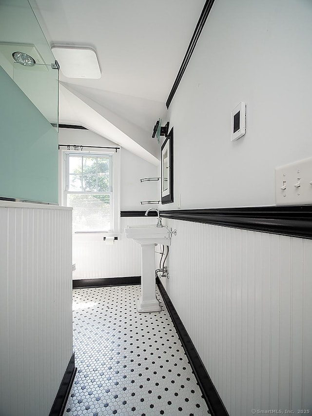 42 Homewood Ave, North Haven, CT 06473 - bathroom with a wainscoted wall and lofted ceiling