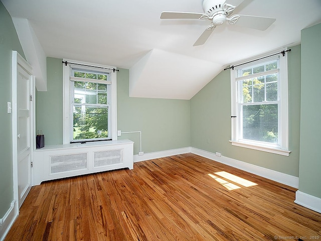 42 Homewood Ave, North Haven, CT 06473 - additional living space featuring wood finished floors, healthy amount of natural light, vaulted ceiling, and a ceiling fan