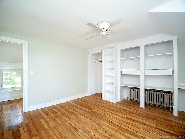 42 Homewood Ave, North Haven, CT 06473 - unfurnished bedroom featuring multiple closets, wood finished floors, and a ceiling fan