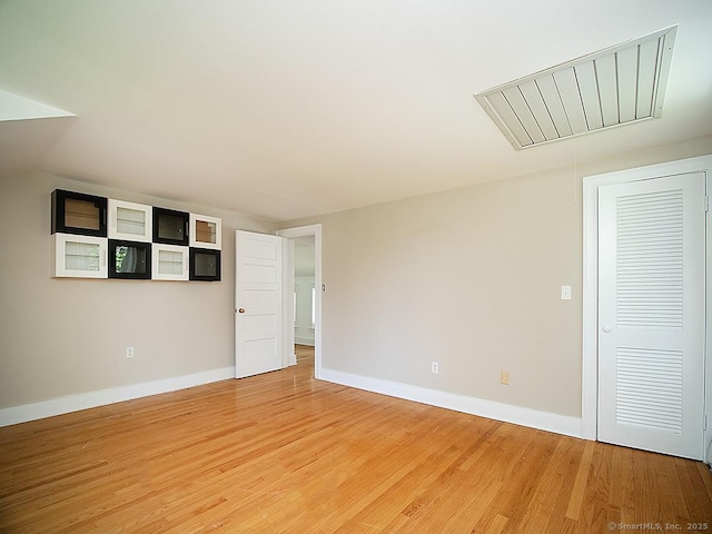 42 Homewood Ave, North Haven, CT 06473 - empty room featuring attic access and light wood-style flooring
