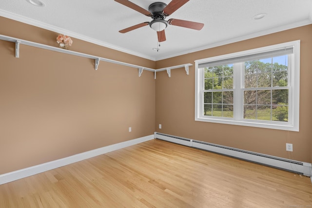 1199 Cornerstone Ct, Cheshire, CT 06410 - empty room featuring a baseboard radiator, light wood-style flooring, crown molding, and ceiling fan