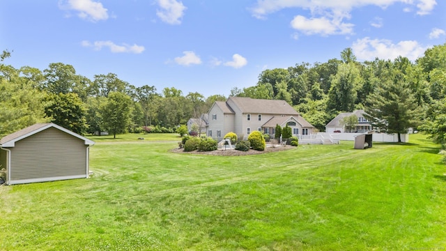 1199 Cornerstone Ct, Cheshire, CT 06410 - view of green lawn with a wooden deck and view of scattered trees