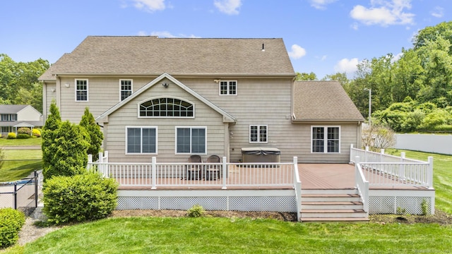 1199 Cornerstone Ct, Cheshire, CT 06410 - rear view of property with a lawn, a deck, roof with shingles, and a hot tub