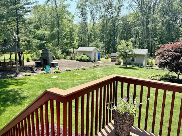 44 Fawn Hill Rd, Shelton, CT 06484 - wooden terrace featuring an outdoor fireplace, a gazebo, a yard, an outdoor structure, and a patio