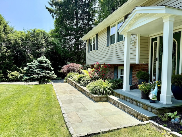44 Fawn Hill Rd, Shelton, CT 06484 - view of grassy yard featuring a porch