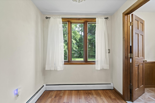136 Bloomfield Ave, Windsor, CT 06095 - entryway with a baseboard radiator and wood finished floors