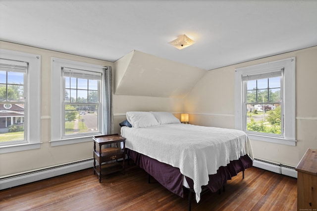 136 Bloomfield Ave, Windsor, CT 06095 - bedroom featuring baseboard heating, multiple windows, wood finished floors, and vaulted ceiling