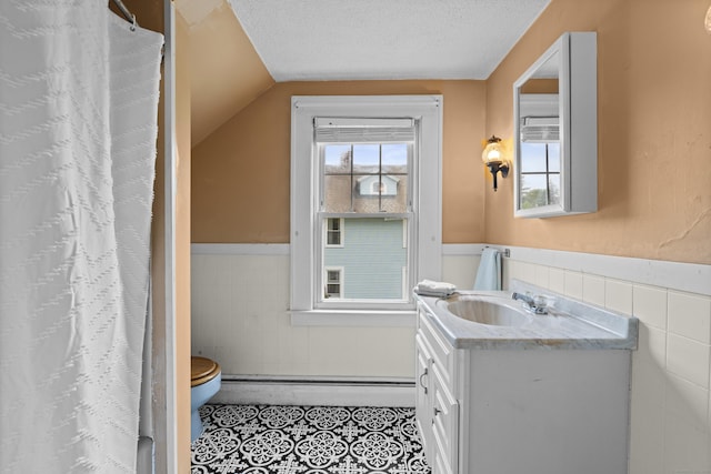 136 Bloomfield Ave, Windsor, CT 06095 - full bathroom with tile walls, wainscoting, a baseboard heating unit, tile patterned floors, and vanity