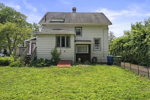 136 Bloomfield Ave, Windsor, CT 06095 - rear view of house with a chimney