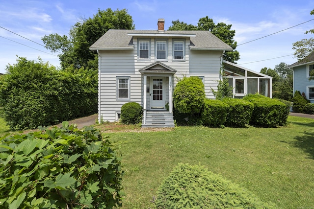 136 Bloomfield Ave, Windsor, CT 06095 - view of front of property featuring a front yard, a chimney, and a shingled roof