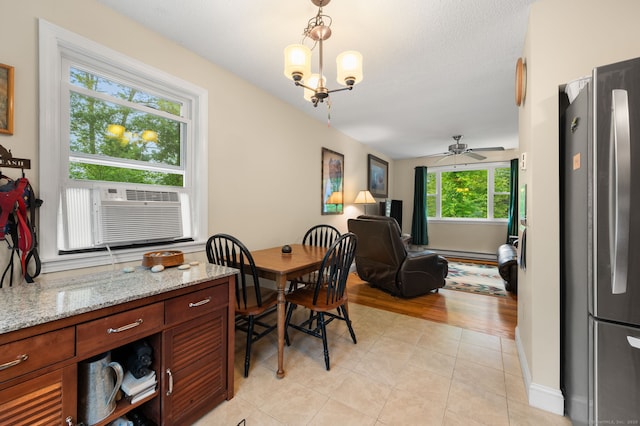 65 Norwich Westerly Rd, North Stonington, CT 06359 - dining space featuring baseboard heating, a ceiling fan, cooling unit, and light tile patterned floors
