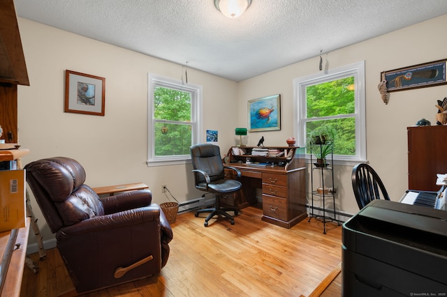 65 Norwich Westerly Rd, North Stonington, CT 06359 - office space featuring light wood-type flooring, a textured ceiling, and a baseboard heating unit