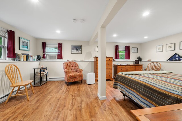 65 Norwich Westerly Rd, North Stonington, CT 06359 - bedroom with a baseboard heating unit, light wood finished floors, recessed lighting, and cooling unit