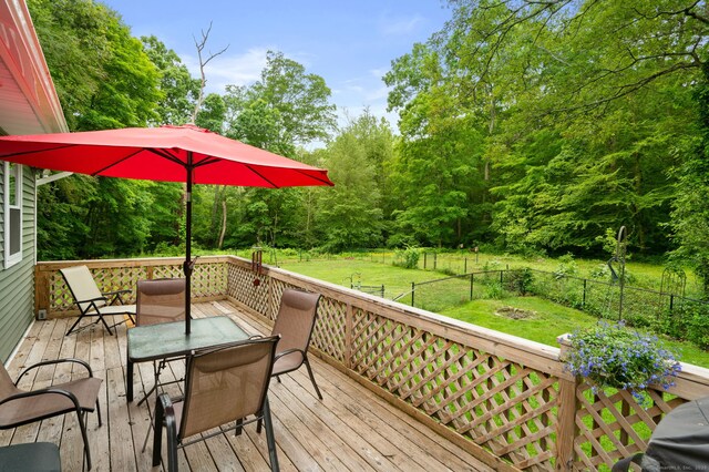 65 Norwich Westerly Rd, North Stonington, CT 06359 - deck featuring a fenced backyard and outdoor dining space