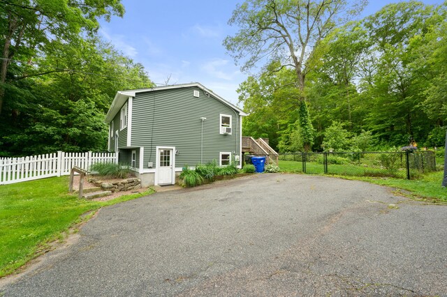 65 Norwich Westerly Rd, North Stonington, CT 06359 - view of side of home with driveway