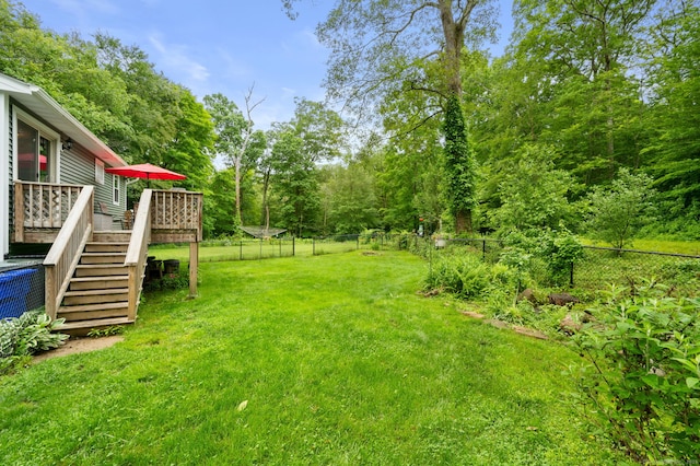 65 Norwich Westerly Rd, North Stonington, CT 06359 - fenced backyard featuring stairs and a wooden deck
