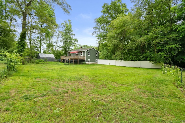 65 Norwich Westerly Rd, North Stonington, CT 06359 - fenced backyard with a wooden deck