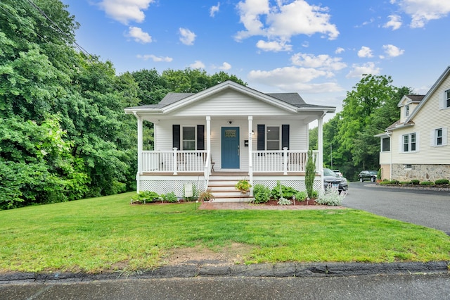 70 Sunnyside Ave, Watertown, CT 06779 - view of front of property with a porch and a front yard