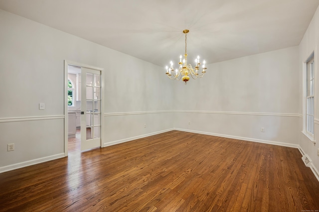12B Hickory Dr, Greenwich, CT 06831 - empty room featuring a chandelier and dark wood finished floors
