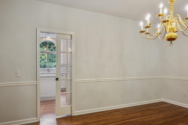 12B Hickory Dr, Greenwich, CT 06831 - unfurnished dining area with a chandelier and wood finished floors