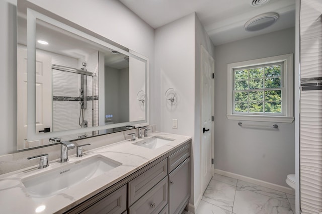 12B Hickory Dr, Greenwich, CT 06831 - full bath featuring double vanity, marble finish flooring, and a shower with door