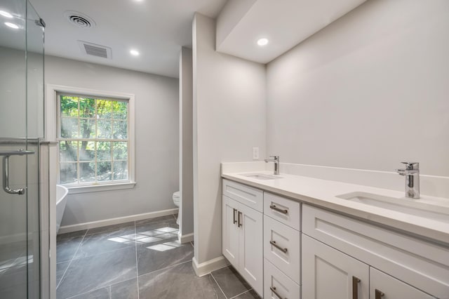 12B Hickory Dr, Greenwich, CT 06831 - full bathroom with double vanity, a freestanding tub, recessed lighting, and a stall shower