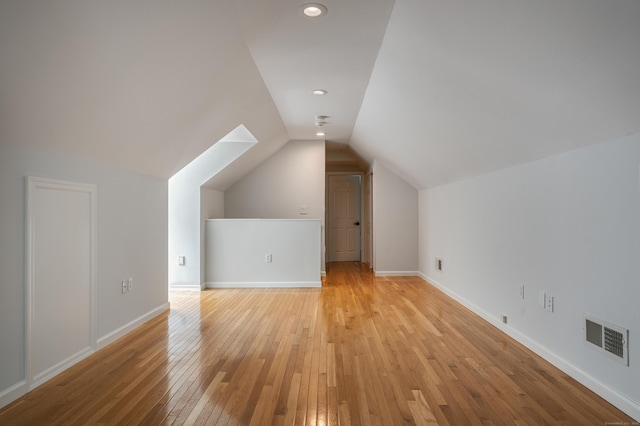 12B Hickory Dr, Greenwich, CT 06831 - additional living space with light wood finished floors, lofted ceiling, and recessed lighting