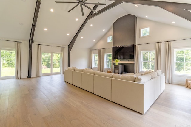 376 Rte 165, Preston, CT 06365 - living room with high vaulted ceiling, light wood-style flooring, ceiling fan, and recessed lighting