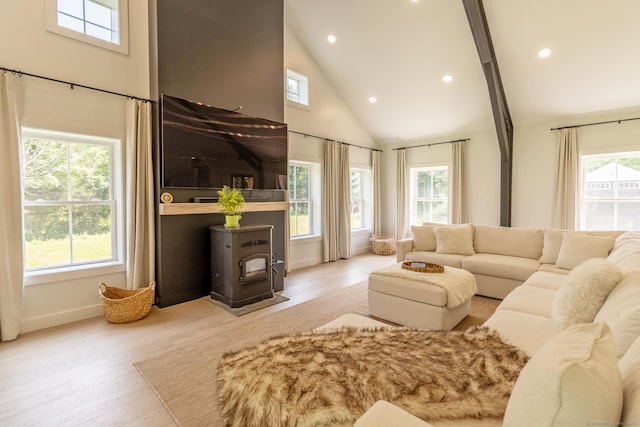 376 Rte 165, Preston, CT 06365 - living room with a wood stove, high vaulted ceiling, recessed lighting, and wood finished floors