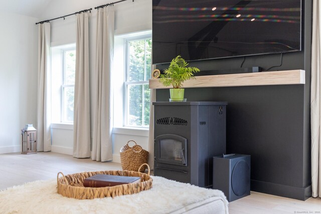 376 Rte 165, Preston, CT 06365 - bedroom featuring wood finished floors and vaulted ceiling