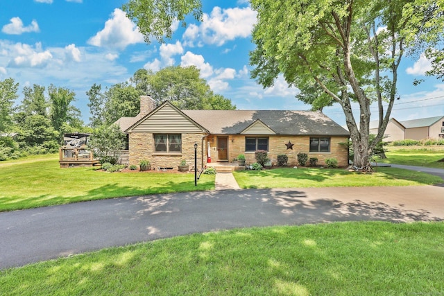 1028 Mountain Rd, Suffield, CT 06093 - ranch-style home with a chimney, stone siding, and a front yard