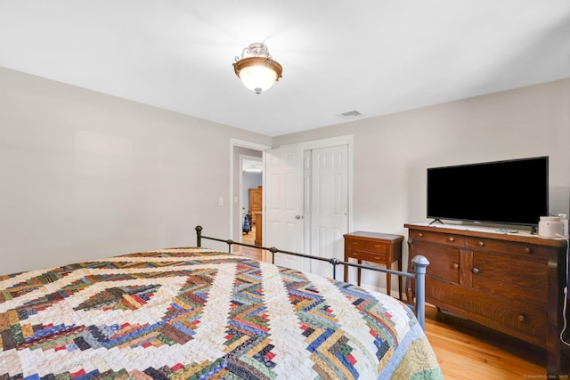 1028 Mountain Rd, Suffield, CT 06093 - bedroom with light wood-style flooring and a closet